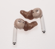 Apple AirPods with custom sleeves